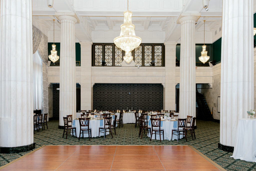 A set up at the Ballroom at McKay looking at tables and the two bathroom entrances