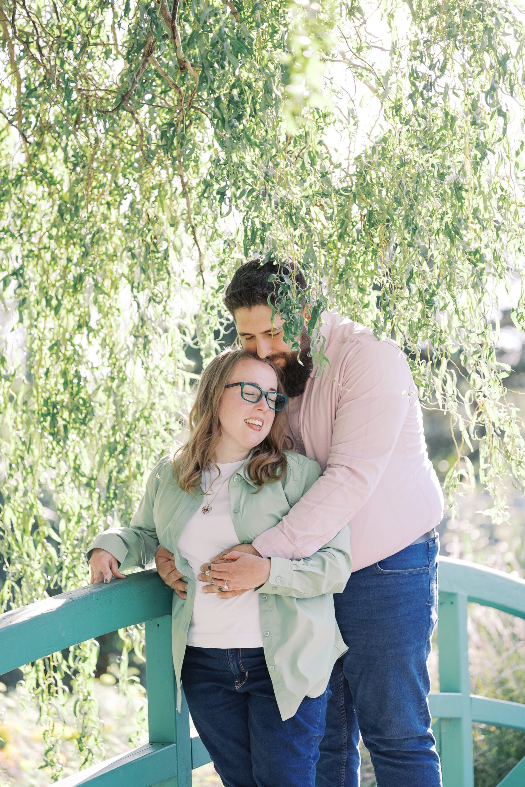 Katie and Saleem standing together on the garden bridge