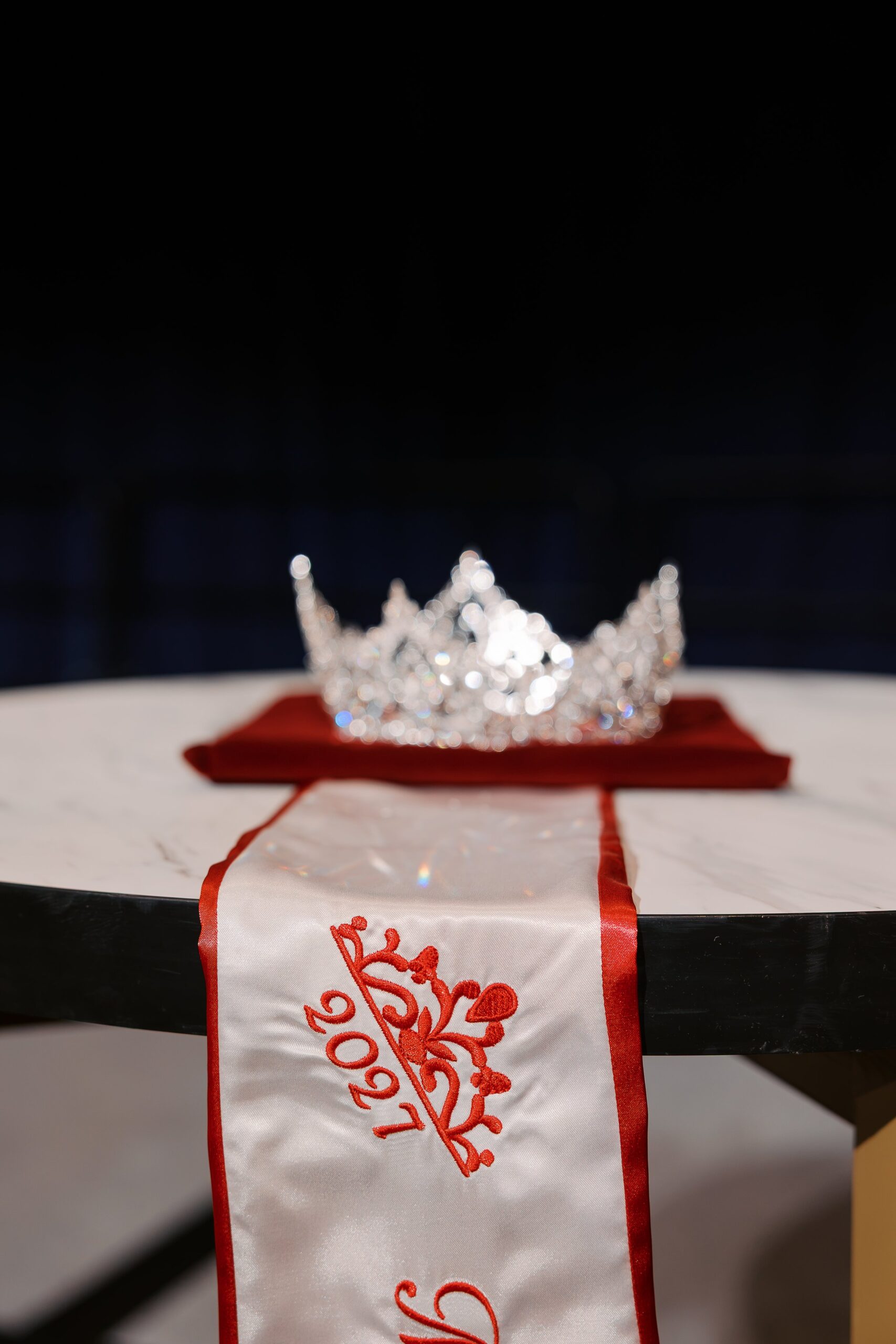 The Ms. Wheelchair America crown and sash on display before the crowning ceremony