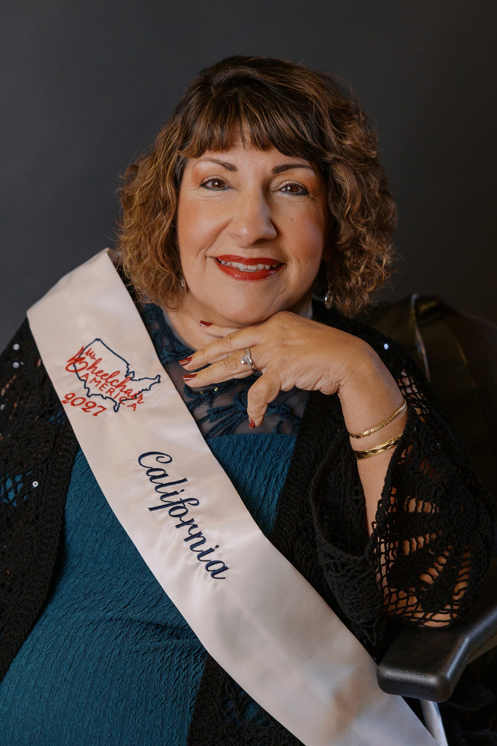 Dr. Sue Elhessen, Ms. Wheelchair California, seated in her wheelchair for her Ms. Wheelchair America 2027 delegate portrait