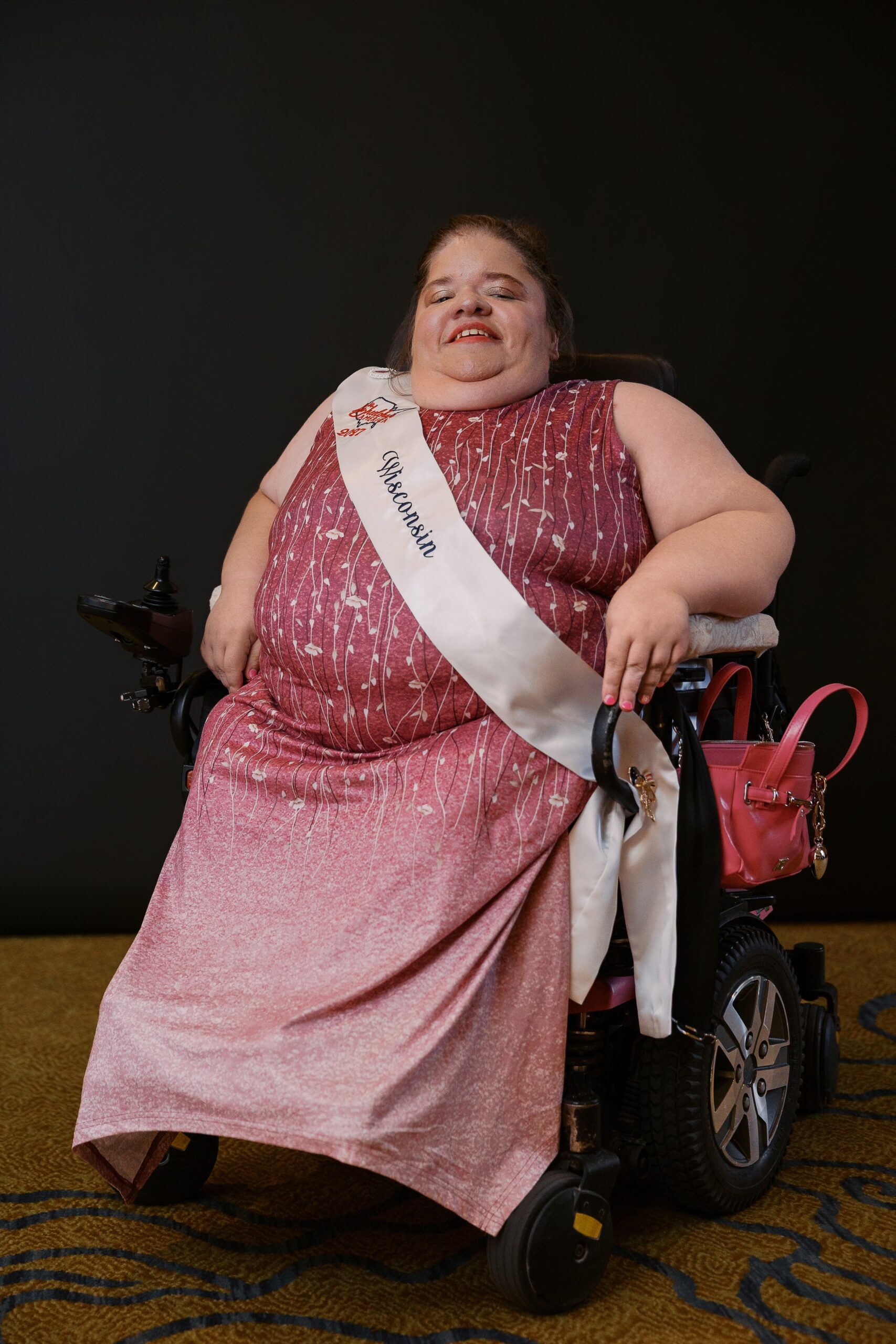 Kristi Scheunemann, Ms. Wheelchair Wisconsin, seated in her wheelchair for her Ms. Wheelchair America 2027 delegate portrait
