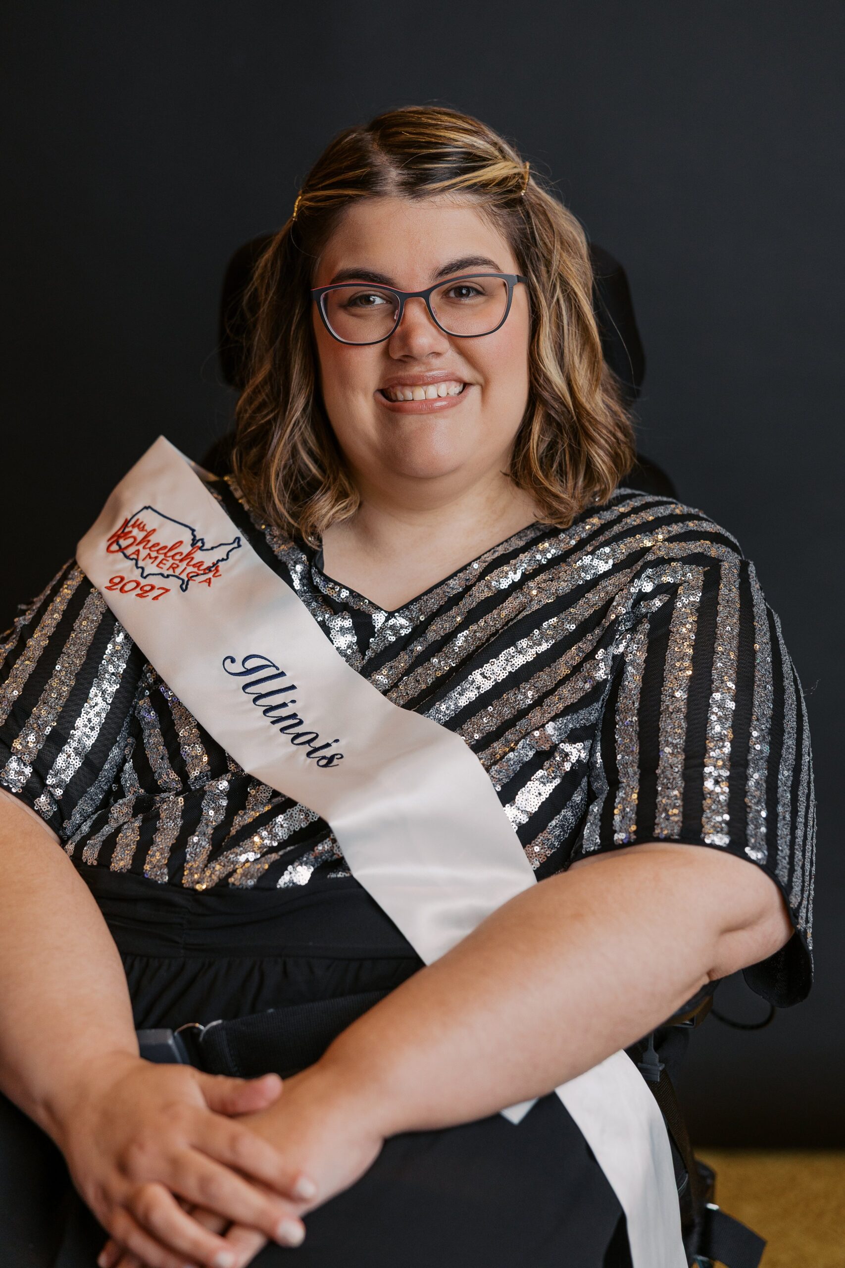 Carrie Mulderink, Ms. Wheelchair Illinois, seated in her wheelchair for her Ms. Wheelchair America 2027 delegate portrait