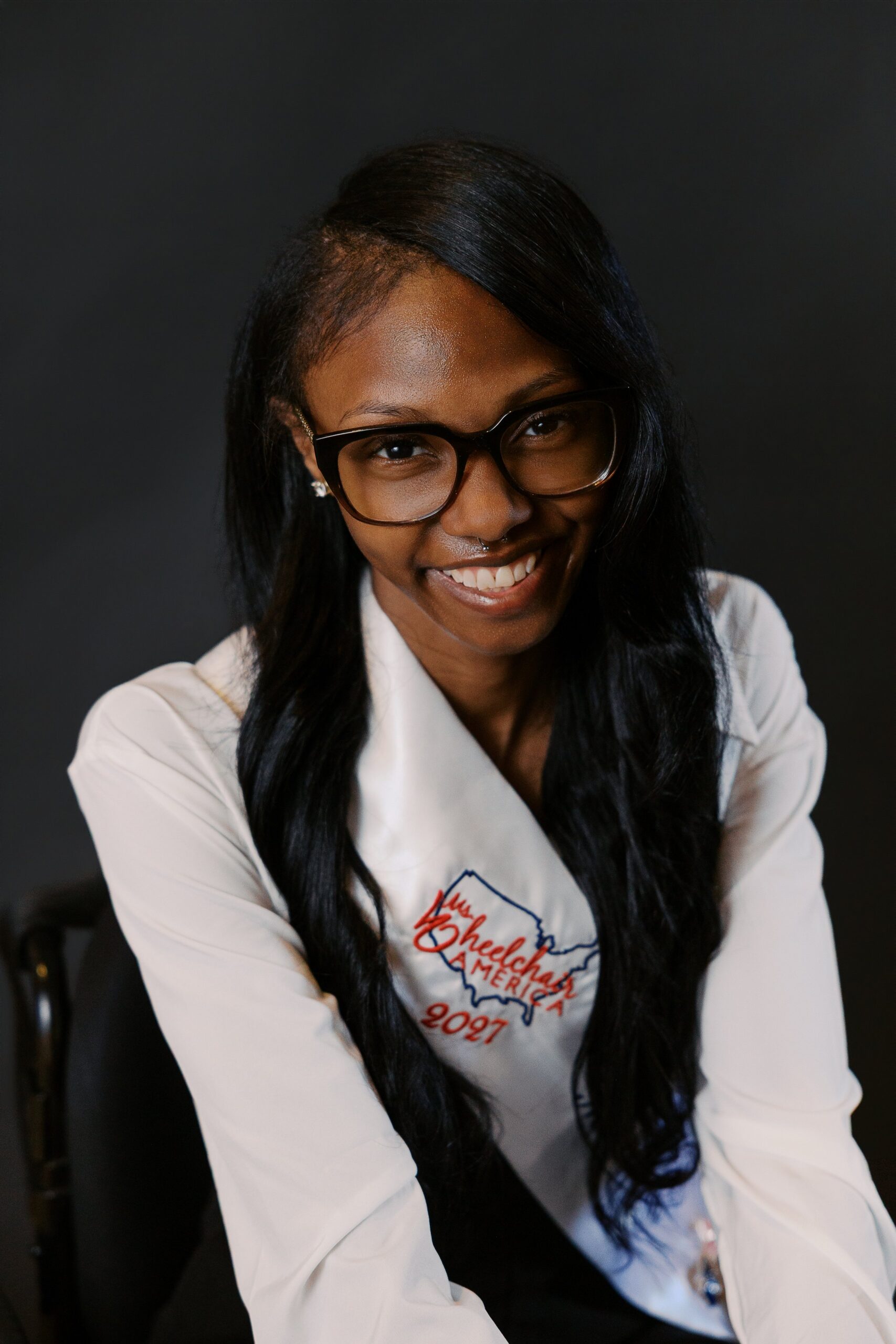 Madison Reid, Ms. Wheelchair Michigan, seated in her wheelchair for her Ms. Wheelchair America 2027 delegate portrait